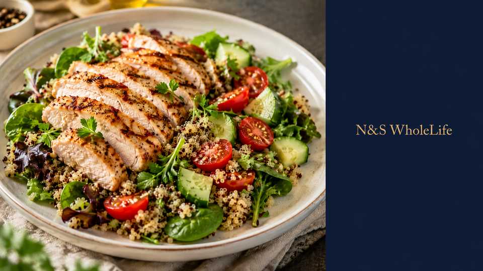 Grilled chicken and quinoa salad with tomatoes, cucumber and greens, from the N&S WholeLife meal library